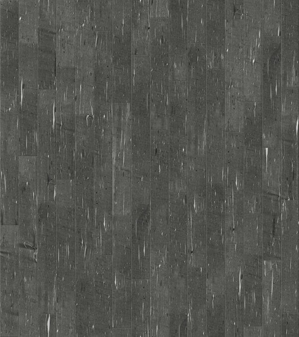 Gray stone-like textured flooring with vertical rectangular tiles and scattered white streaks.