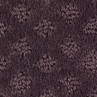 Dark brown carpet with floral pattern.