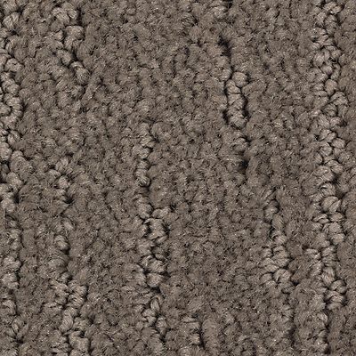 Close-up of a gray carpet with a textured, looped pattern.