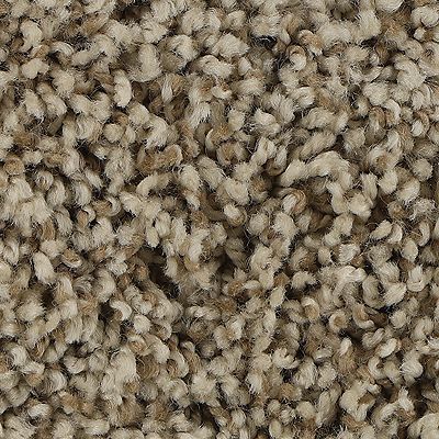 Close-up of beige and brown looped carpet, textured and dense.