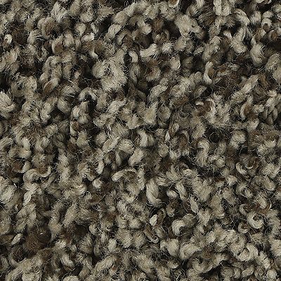 Close-up of gray and brown loop pile carpet.