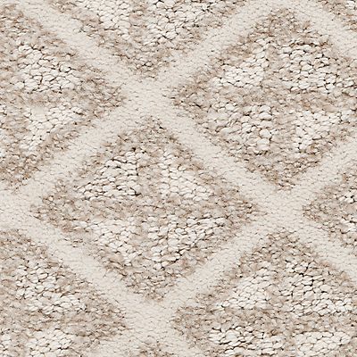 Beige and cream diamond pattern carpet.