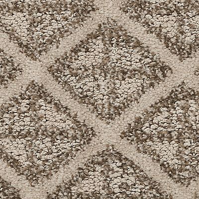 Beige patterned carpet with diamond shapes in shades of brown.