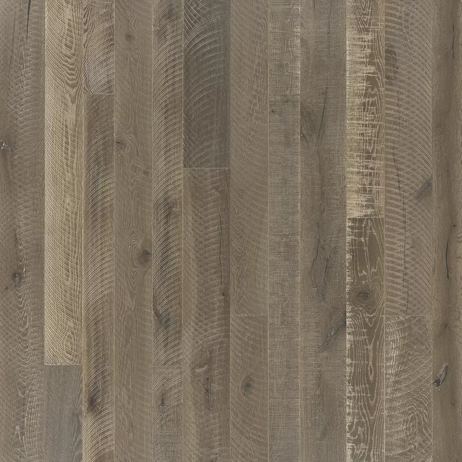Wooden floorboards in shades of gray and brown, with visible grain and texture.