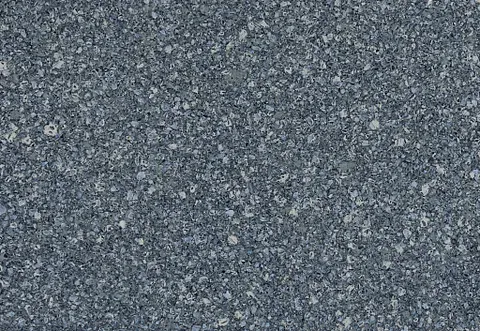 Dark blue speckled granite surface.