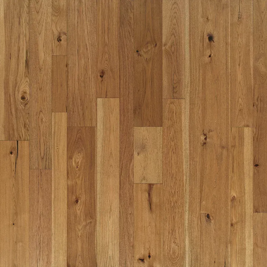 Wooden floorboards in shades of brown, showing grain and knots.