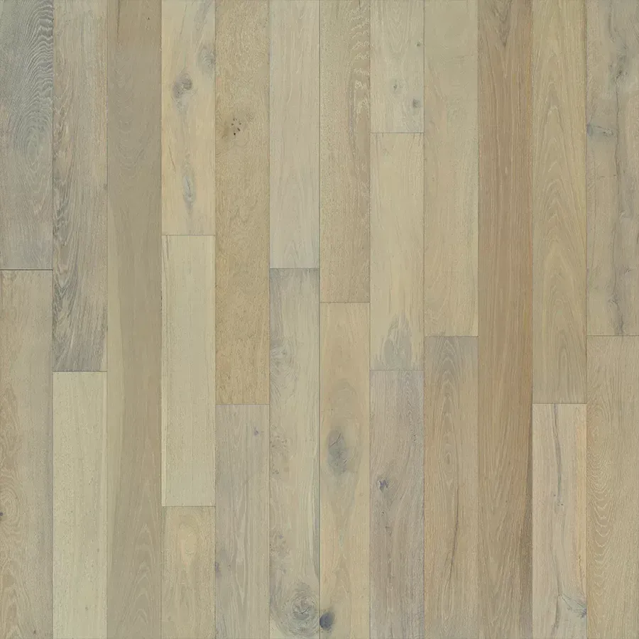 Light-toned hardwood flooring, featuring vertical planks with varying shades of beige and gray.