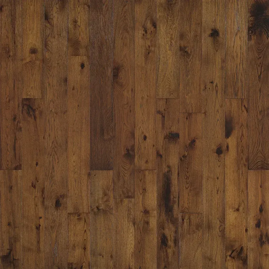 Dark brown hardwood flooring with various wood grains and knots.