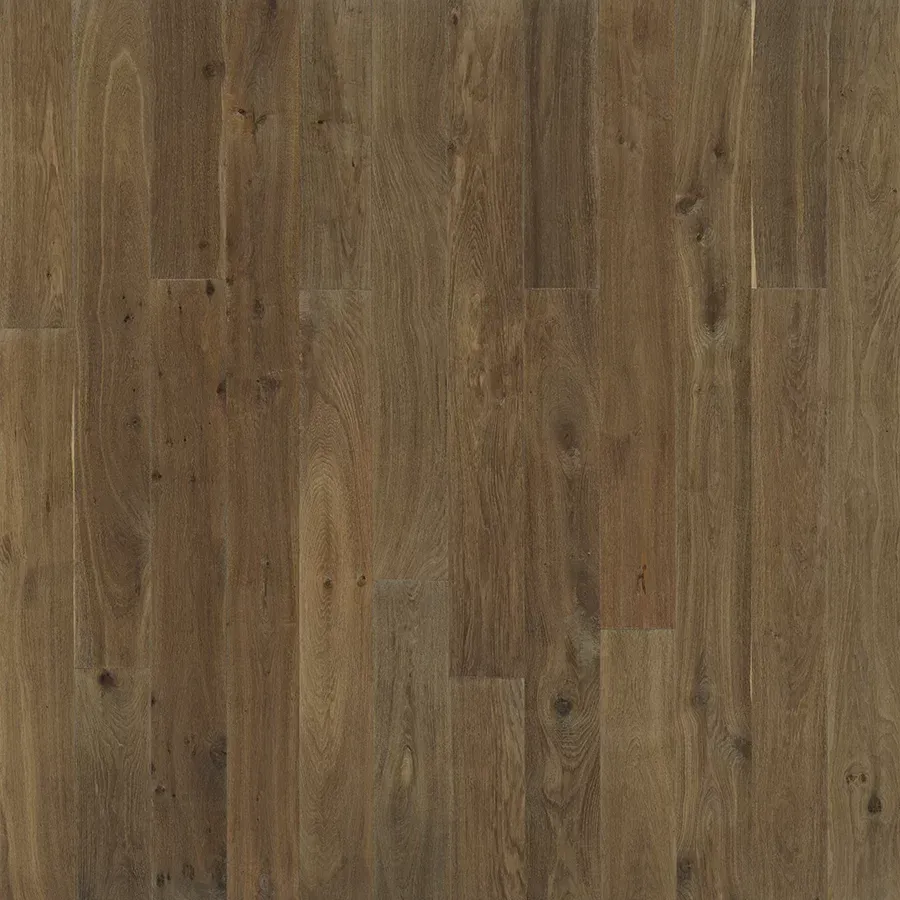 Brown wood flooring with varying shades and grain patterns.