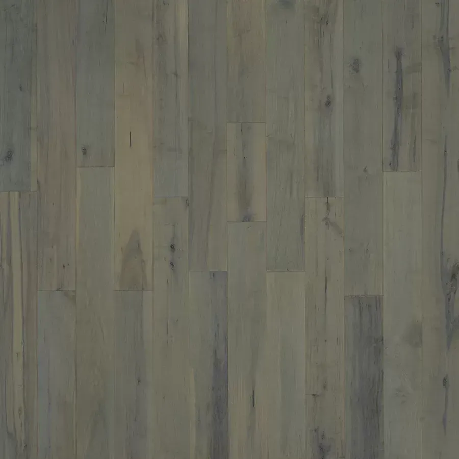 Gray and tan hardwood flooring with a weathered appearance.