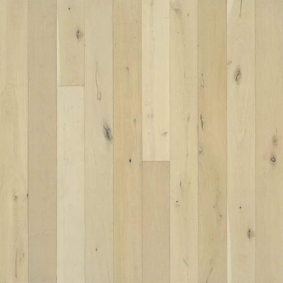 Light blonde hardwood floor planks with subtle grain and knots.