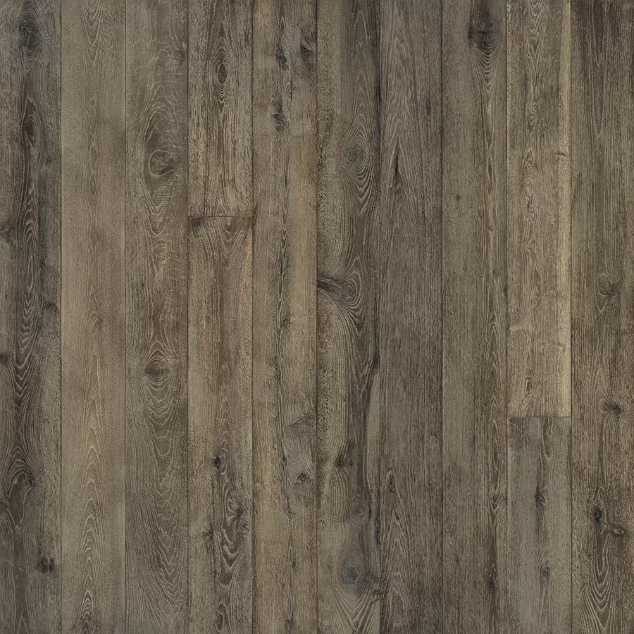 Dark wood plank flooring with various shades of brown and visible grain.
