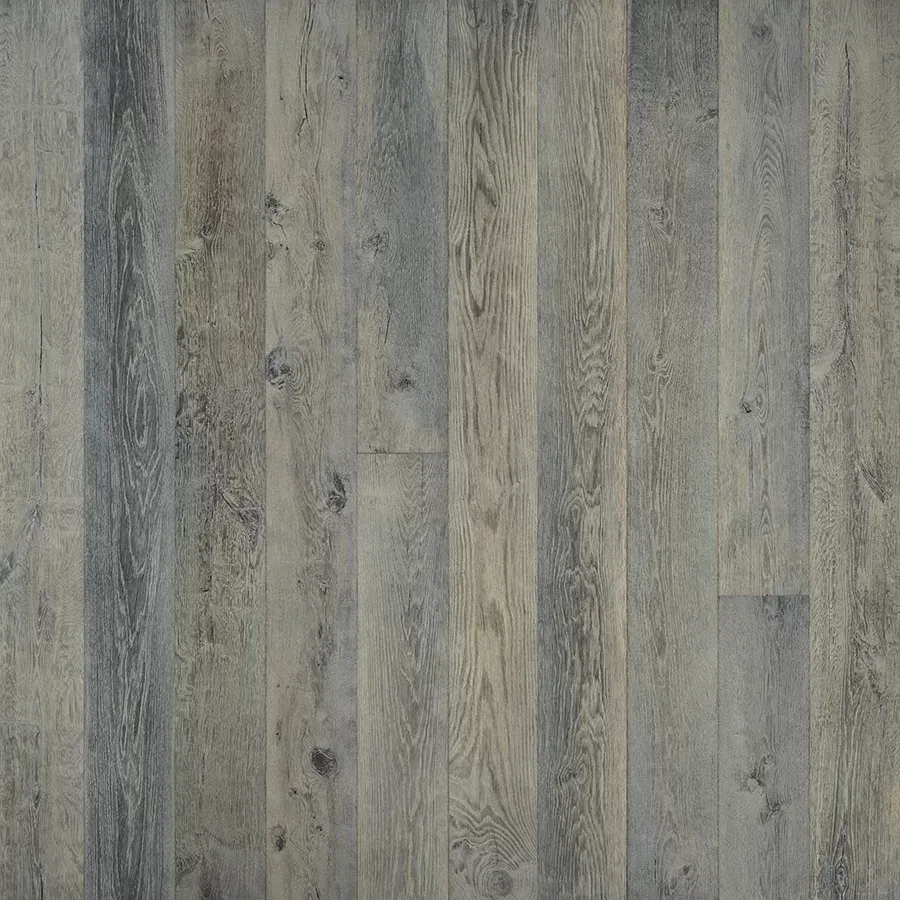Gray-toned wooden planks arranged vertically, showcasing varying shades and wood grain.