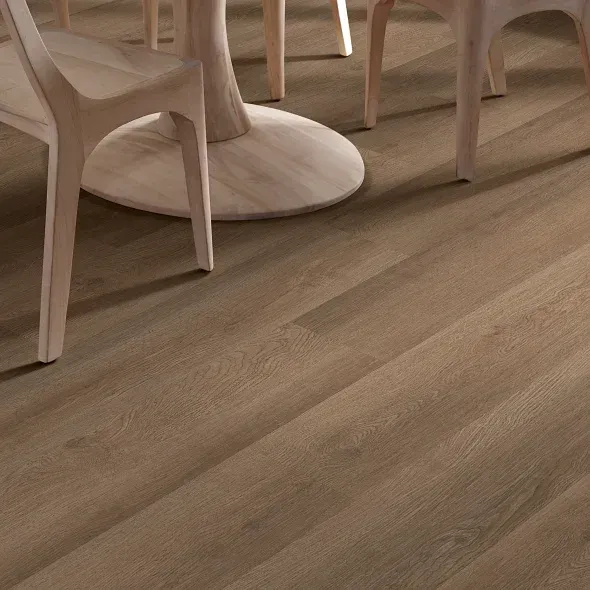 Wooden floor with light-colored chairs and a table base.