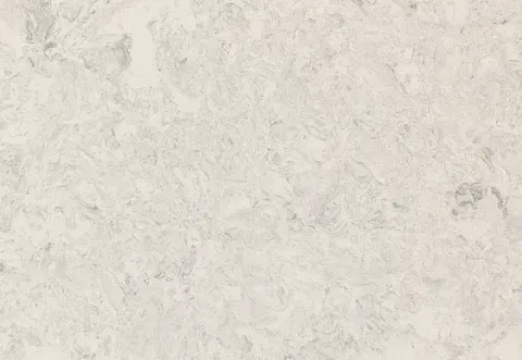 Light beige quartz countertop with mottled, textured appearance.
