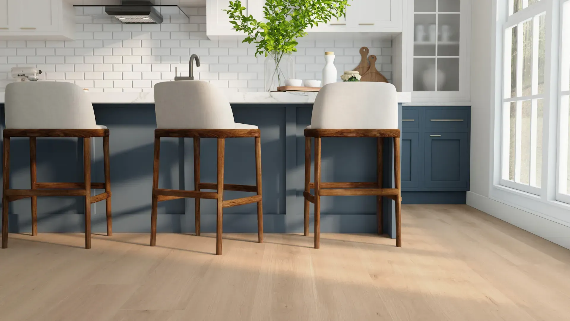 Kitchen with blue cabinets, white backsplash, wood floors, and three bar stools.