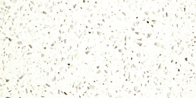 White surface with speckled gray, black, and beige fragments.