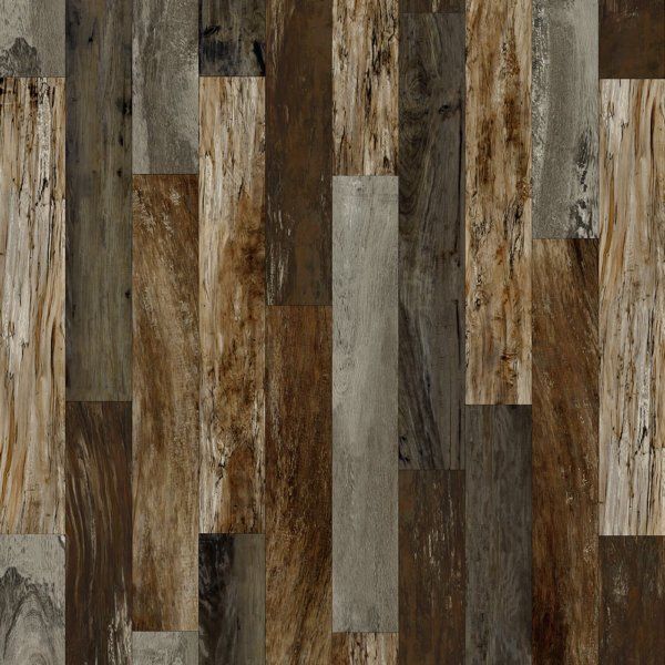 Wood flooring with various shades of brown and gray planks.