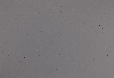 Gray wall with small imperfections.