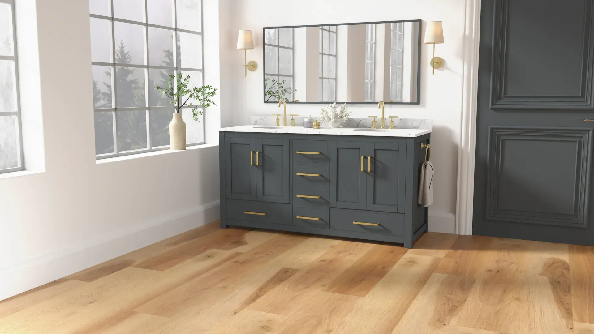 Bathroom with dark blue vanity, gold fixtures, marble countertop, and hardwood floors.