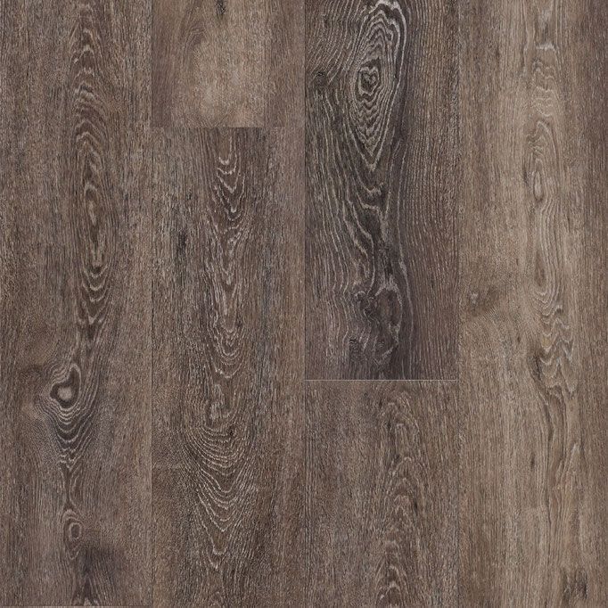 Close-up of dark brown wood-look flooring with visible grain and knots.