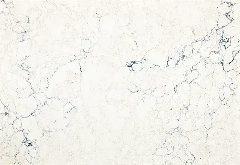 Cream-colored quartz countertop with blue-grey veining.