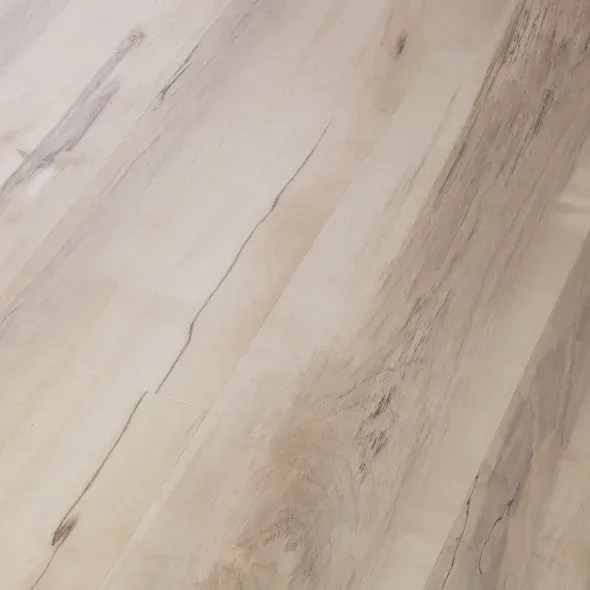Light wood flooring with varying grain patterns and a neutral tone.