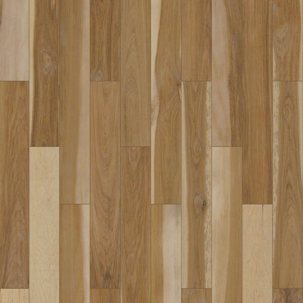 Wood flooring with varying shades of light and dark brown planks arranged in a staggered pattern.
