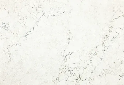 Off-white marble surface with dark grey veining.