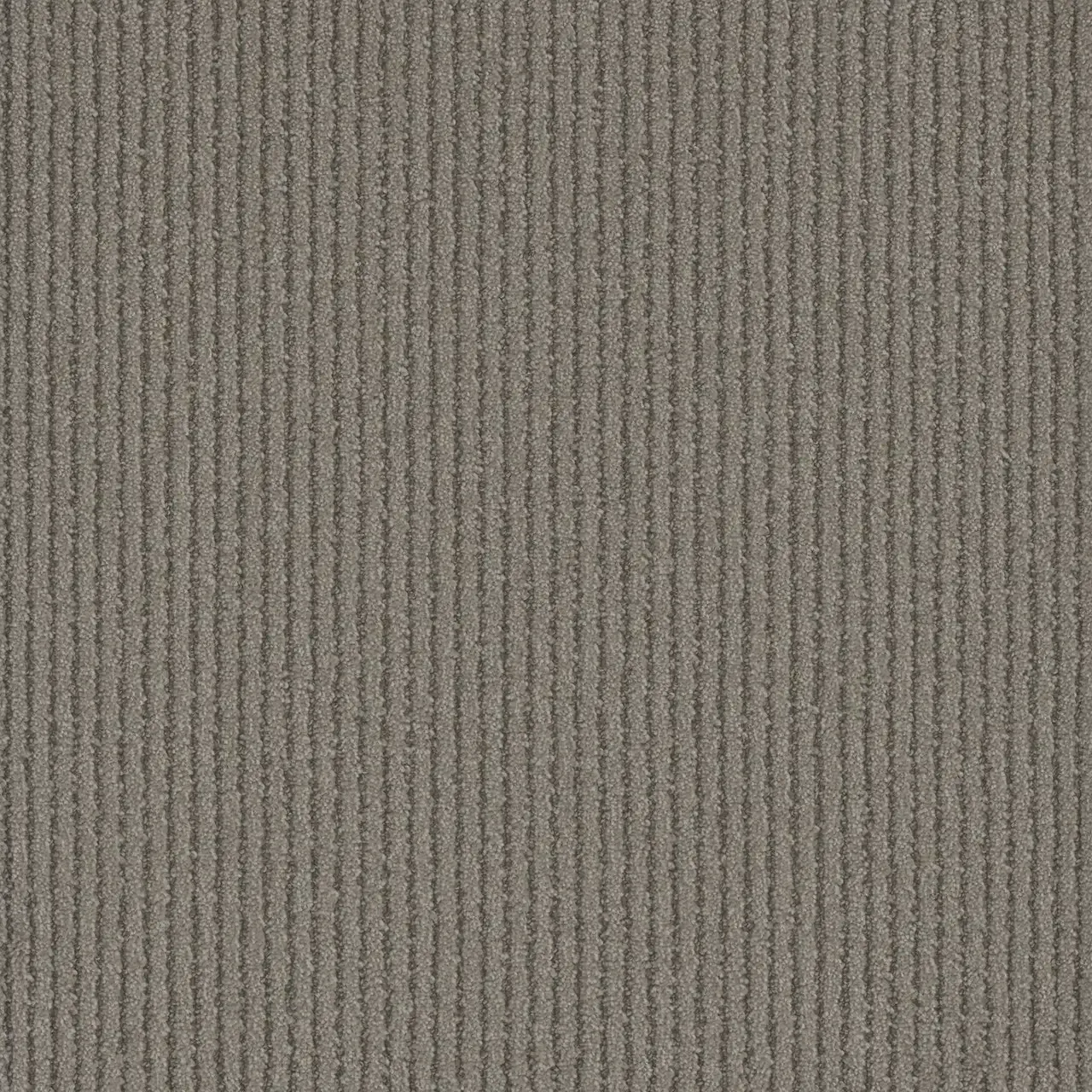 Close-up of gray corduroy fabric with vertical ribbed pattern.