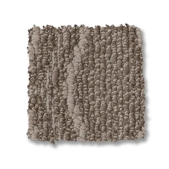 Brown textured carpet sample with varying shades and visible pile.