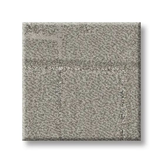 Square of textured, gray carpet.