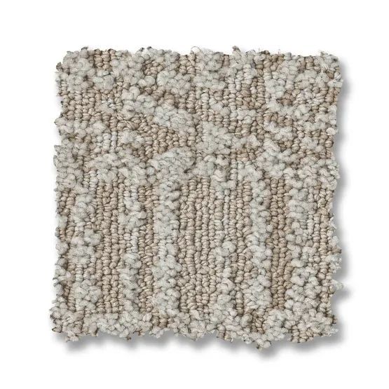 Beige and cream patterned carpet sample.