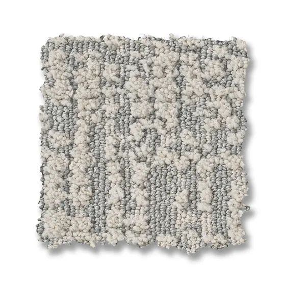 Close-up of a square carpet sample with a textured pattern of light and dark gray and white.