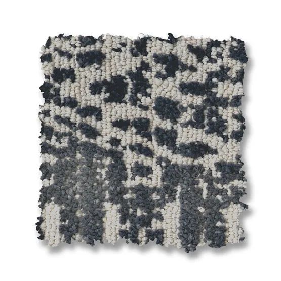Carpet sample with dark gray and off-white pattern.