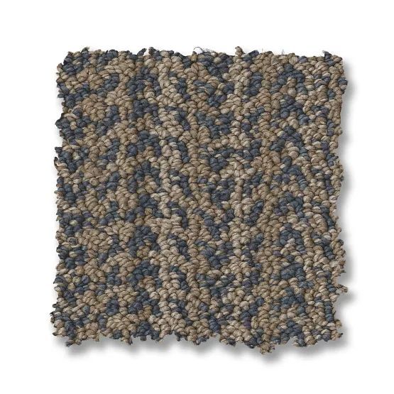 Multi-colored speckled carpet sample with gray, tan, and brown fibers.