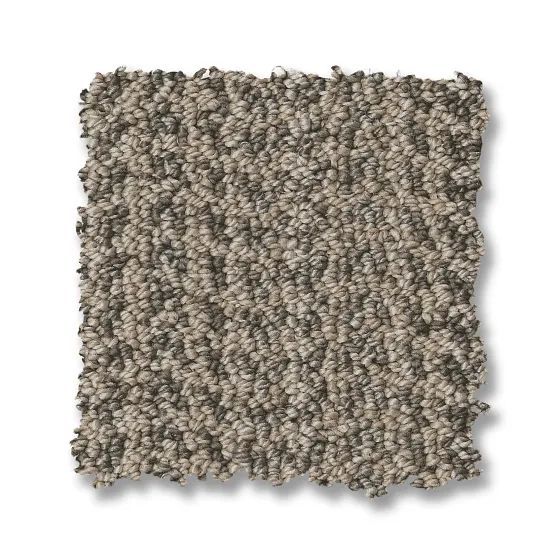 Neutral-toned carpet sample with varying shades of tan and gray, showing a textured loop pile.