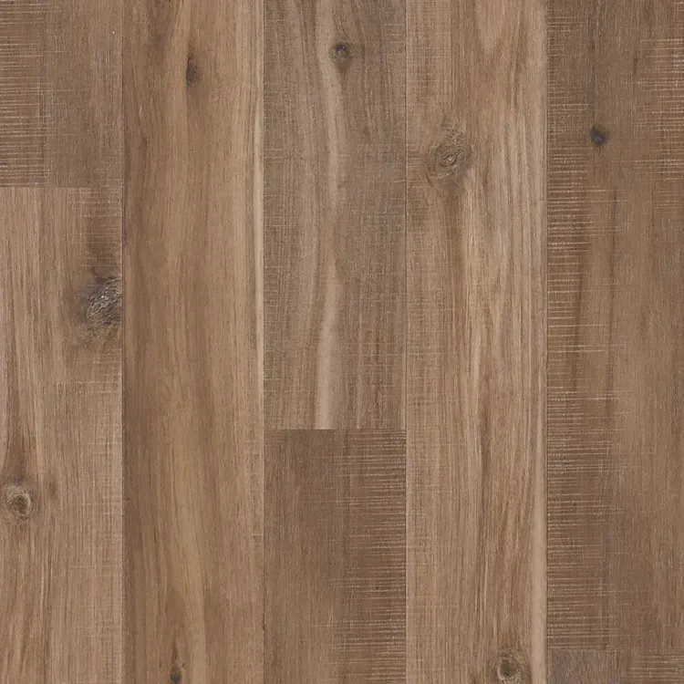 Close-up view of light brown wood flooring with grain and knots.