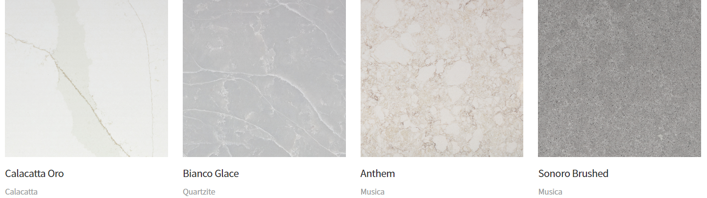 Four samples of countertop materials: white, gray with veining, light beige, and dark gray.