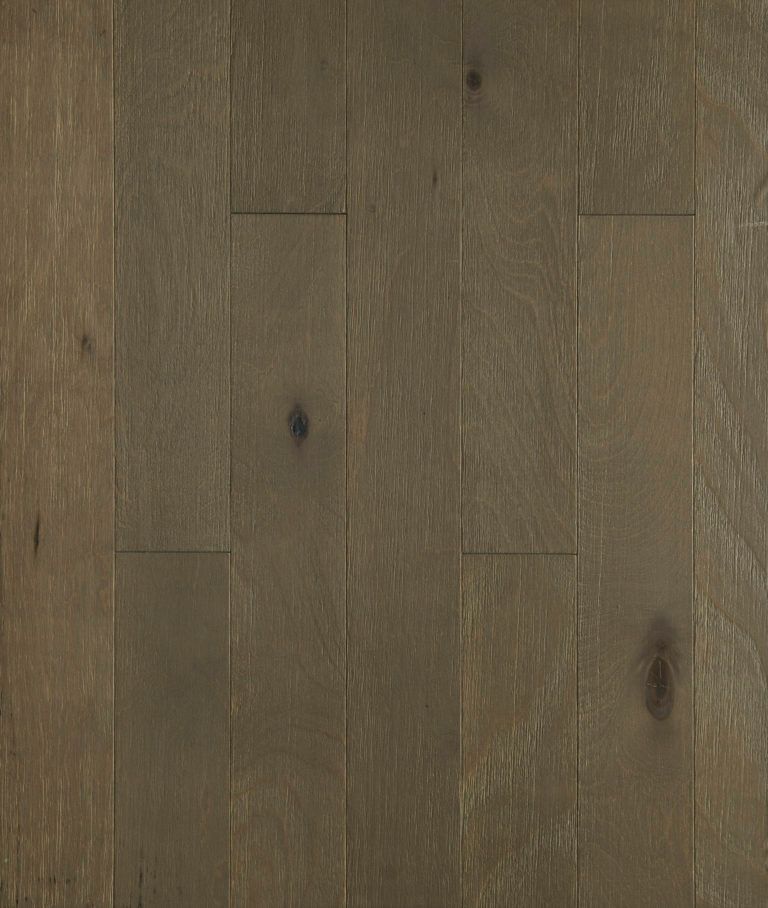 Dark wood floorboards with varying shades of brown and visible grain patterns.