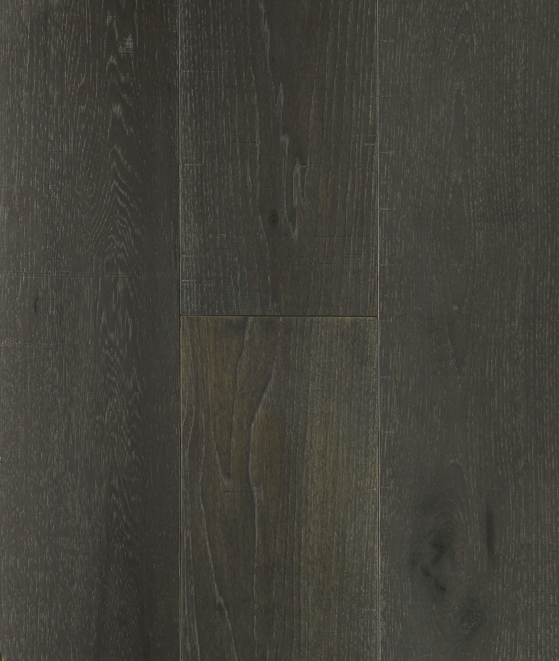 Dark gray hardwood flooring, featuring wood grain texture and slight variations in color.