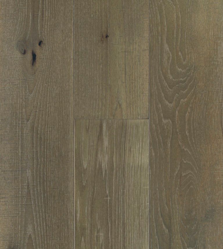 Close-up of hardwood flooring. Gray-brown planks with visible wood grain and knots.
