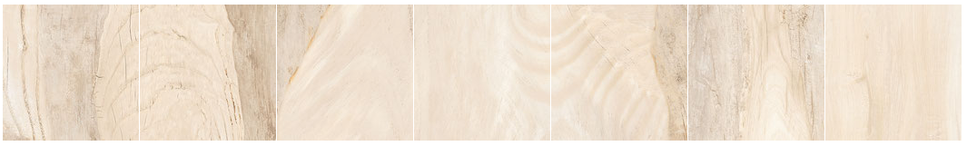 Light-colored wood grain background with vertical planks, soft focus effect.