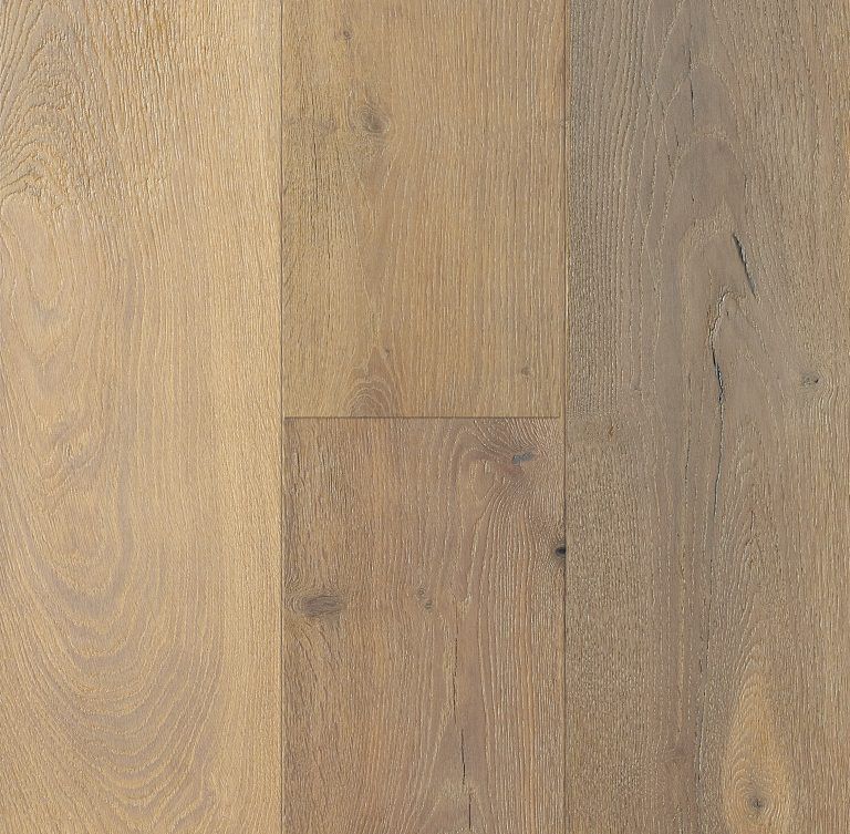 Light brown wood flooring with varying shades and wood grain.