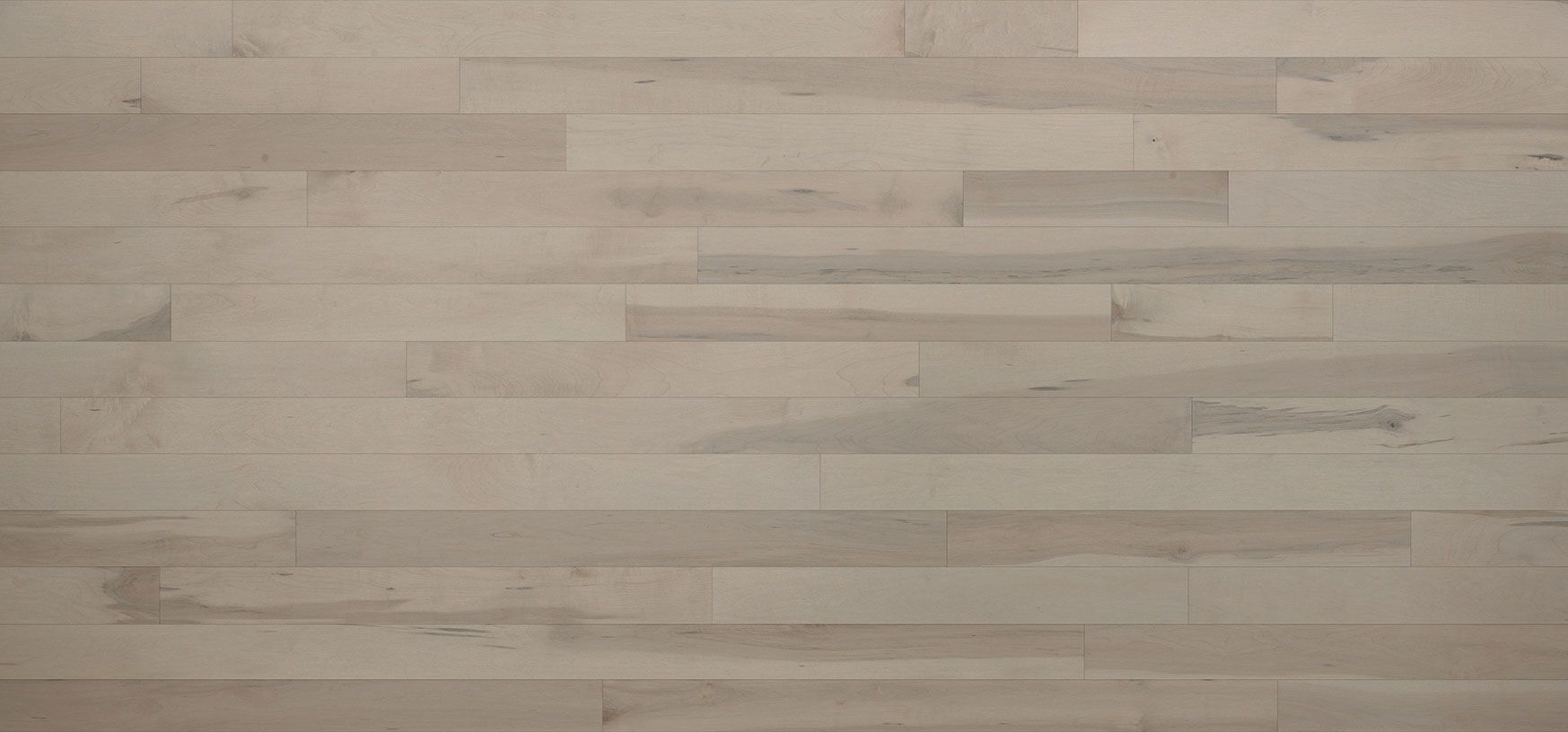 Light-colored wooden floorboards, arranged horizontally.