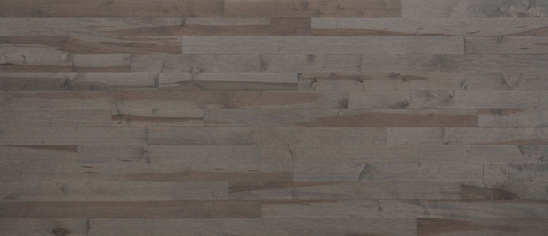 Wooden planks in a dark grey and brown color.
