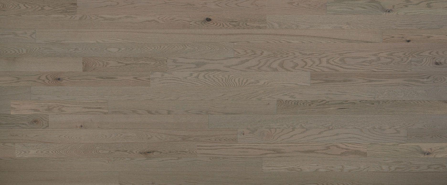 Wooden floorboards with a subtle wood grain pattern in neutral tones.