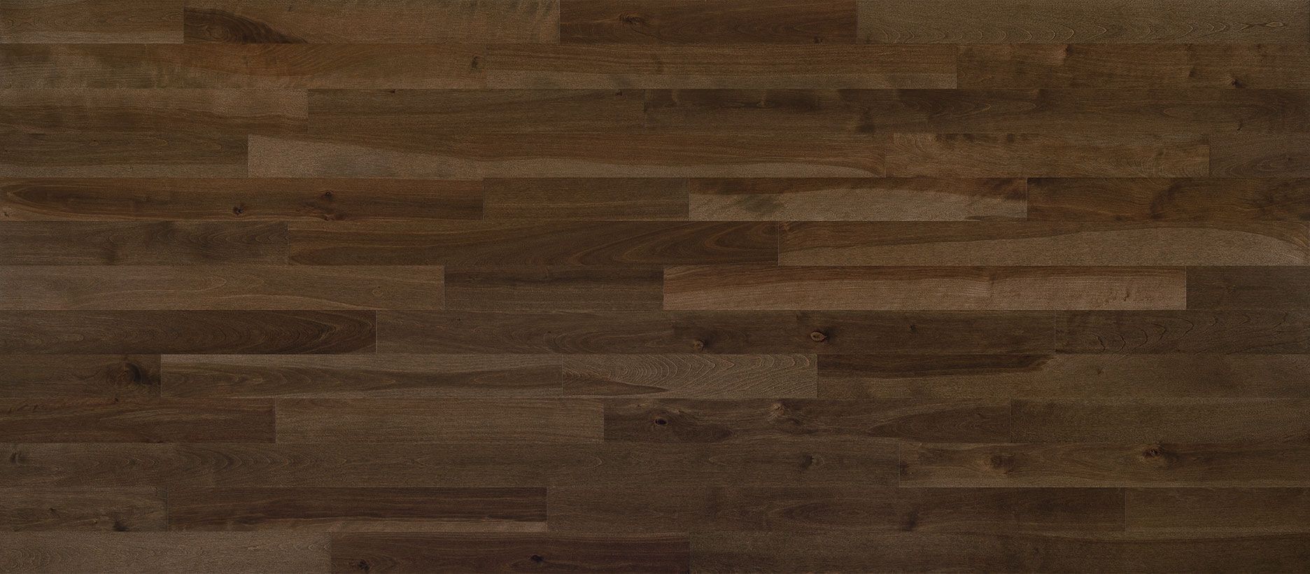 Dark brown wooden floor with varying shades and grain patterns.
