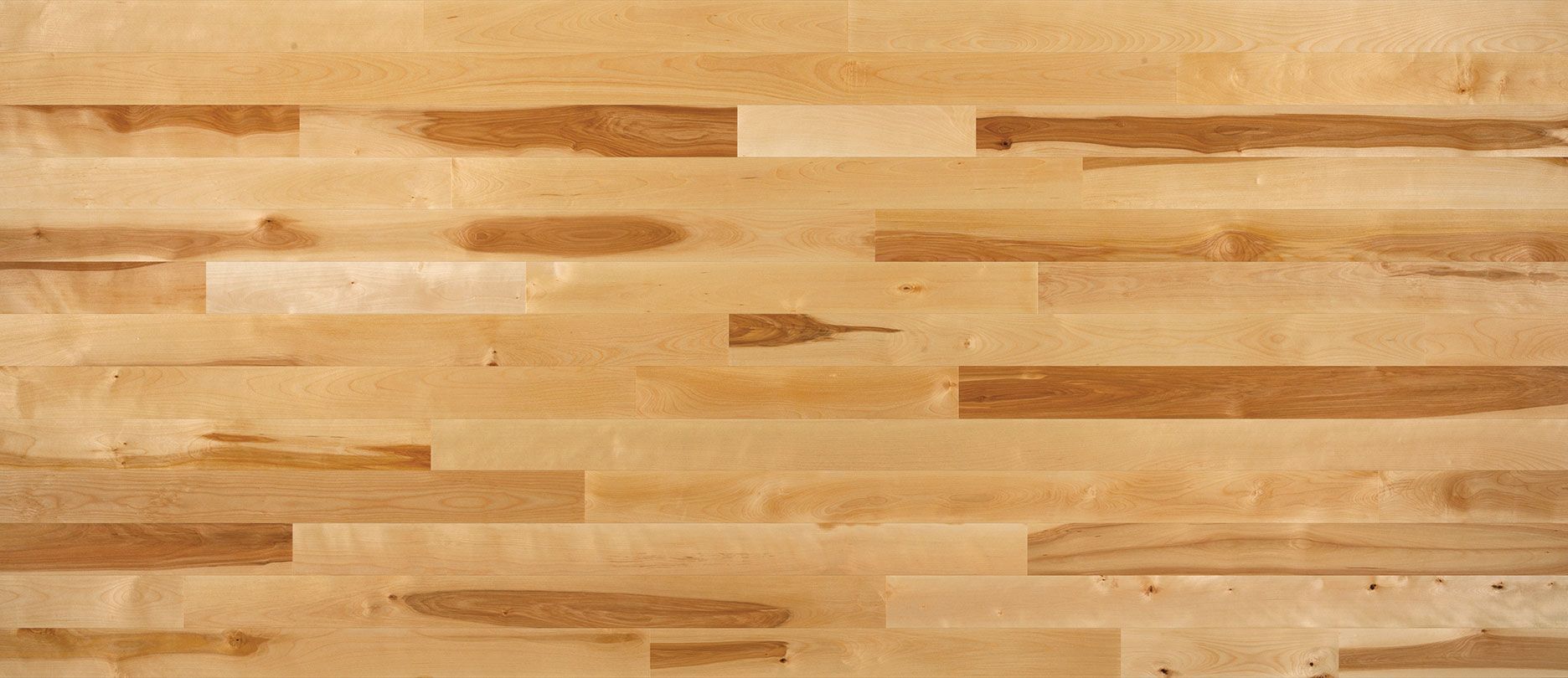 Wood floor with a stain-like mark in the middle.