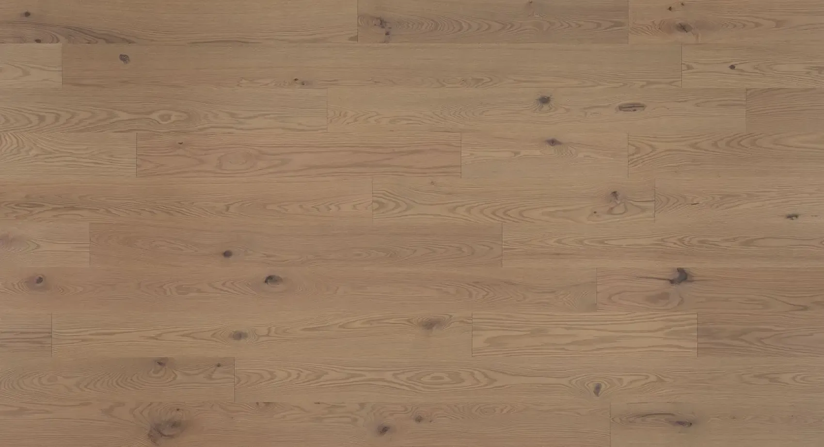 Light brown wood floor with a textured grain.